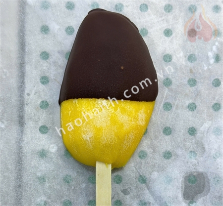 FROZEN MANGO STICKS DIPPED  IN CHOCOLATE